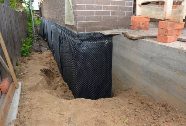 SJ Waterproofing Pros technician performing targeted Foundation Crack Repair assessment in Hampton, GA
